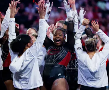 Gymnast Naya Howard celebrates