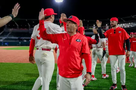Ike Cousins Head Baseball Coach Wes Johnson after Georgia’s game against FGCU at Foley Field in Athens, Ga., on Saturday, March 1, 2025. (Conor Dillon/UGAAA)