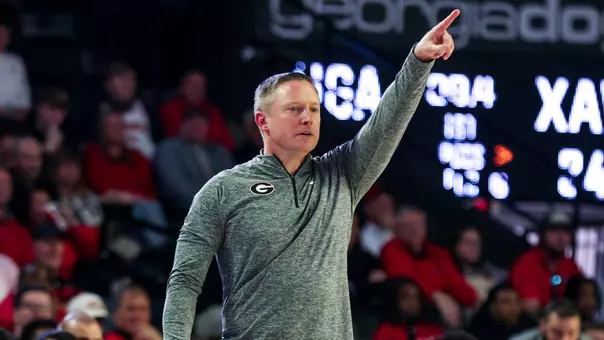 Mike White coaches against Xavier in the first round of the 2024 NIT (photo by Olivia Wilson).
