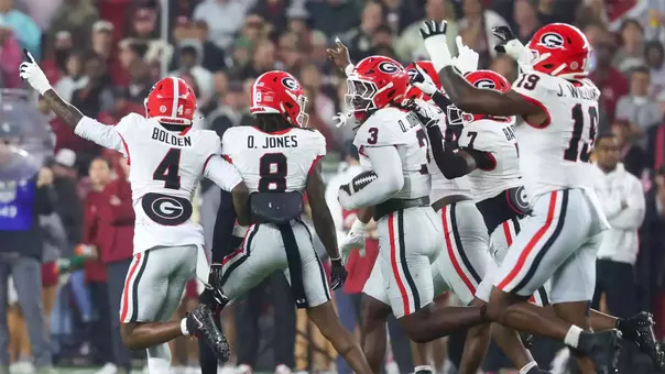 Oct 10, 2026; Tuscaloosa, Alabama, USA; Georgia Bulldogs linebacker Quintavius Johnson (3) celebrates with teammates after recovering a fumble against the Alabama Crimson Tide during the first quarter at Saban Field at Bryant-Denny Stadium. Mandatory Credit: David Leong-Imagn Images
