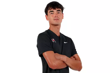 Junior Andrew Delgado during a photoshoot with Georgia men's tennis.