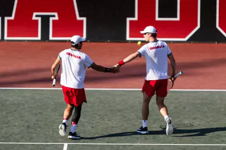 Gabriele Vulpitta and Will Jansen high five on doubles court two