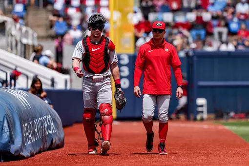 Georgia catcher and outfielder Daniel Jackson (3), Georgia assistant coach and recruiting coordinator Brock Bennett before Georgia’s game against Ole Miss at Swayze Field in Oxford, Ms., on Saturday, April 25, 2026. (Conor Dillon/UGAAA)