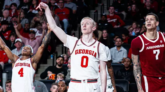 Georgia guard Marcus Millender (4), Georgia guard Blue Cain (0) during Georgia’s game against Arkansas at Stegeman Coliseum in Athens, Ga., on Saturday, Jan. 17, 2026. (Emil Madden/UGAAA)