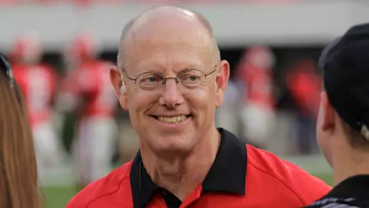 Dr. Fred Reifsteck on the sidelines of a Georgia football game.