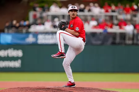 Georgia pitcher Caden Aoki (12) during Georgia’s game against Liberty in the 2026 DI Baseball Championship Athens Regional at Foley Field in Athens, Ga., on Sunday, May 31, 2026. (Conor Dillon/UGAAA)