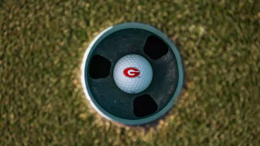 Shot of Georgia "G" golf ball in cup (photo by Conor Dillon).