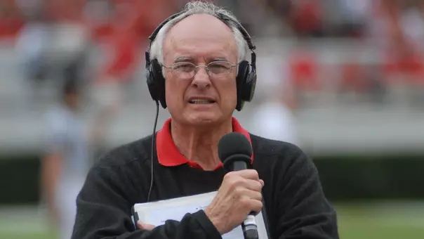 Loran Smith on the sidelines of a Georgia football game.