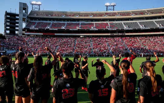The Georgia women's soccer team gathers together prior to its match against JMU on Dooley Field at Sanford Stadium in Athens, Ga., on Thursday, Aug. 20, 2026. (Conor Dillon/UGAAA)