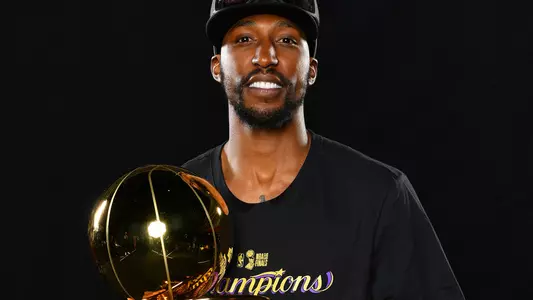 Kentavious Caldwell-Pope with the 2020 NBA trophy (photo courtesy NBAE/Getty Images).