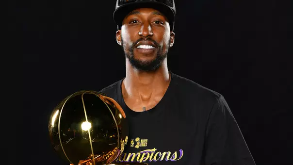 Kentavious Caldwell-Pope with the 2020 NBA trophy (photo courtesy NBAE/Getty Images).