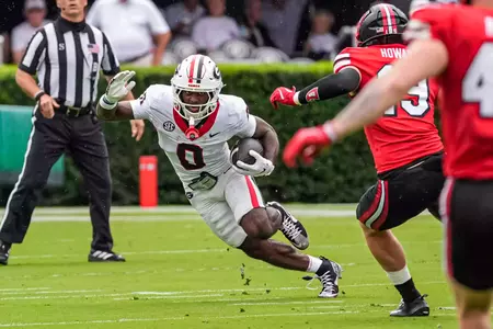 Sep 12, 2026; Athens, Georgia, USA; Georgia Bulldogs wide receiver Sacovie White-Helton (0) returns a punt against the Western Kentucky Hilltoppers during the first half at Sanford Stadium. Mandatory Credit: Dale Zanine-Imagn Images