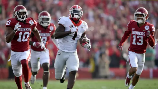 Running back Sony Michel #1 of the Georgia Bulldogs scores a 75-yard touchdown run in the first half against the Oklahoma Sooners in the 2018 College Football Playoff Semifinal at the Rose Bowl Game presented by Northwestern Mutual at the Rose Bowl on January 1, 2018 in Pasadena, California. (Photo by Kevork Djansezian/Getty Images)