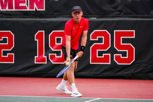 Noah Johnston during an NCAA match in Athens against Elon.