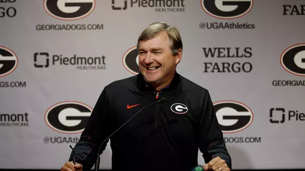 Coach Kirby Smart smiling at Press Conference