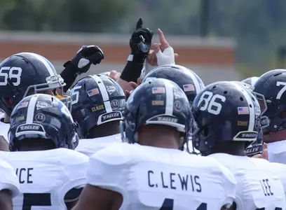Eagles huddle during pre-game