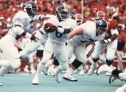 Running back Gerald Harris, quarterback Tracy Ham and guard Charles Cochran
