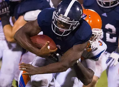 Jerick McKinnon pushes forward for an Eagle first down