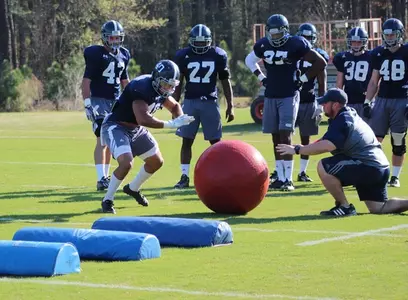 Linebacker Edwin Jackson does through drills Monday