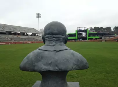 Erk Russell bust overlooks construction at Paulson Stadium