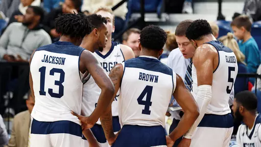 Men's Basketball Huddle