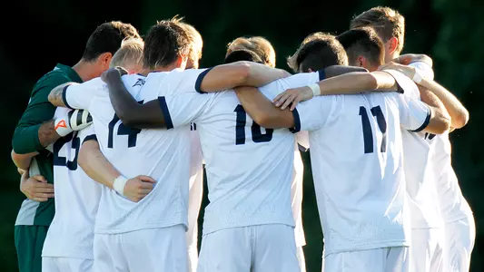 GS Men's Soccer huddle