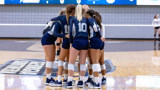 Volleyball team huddle
