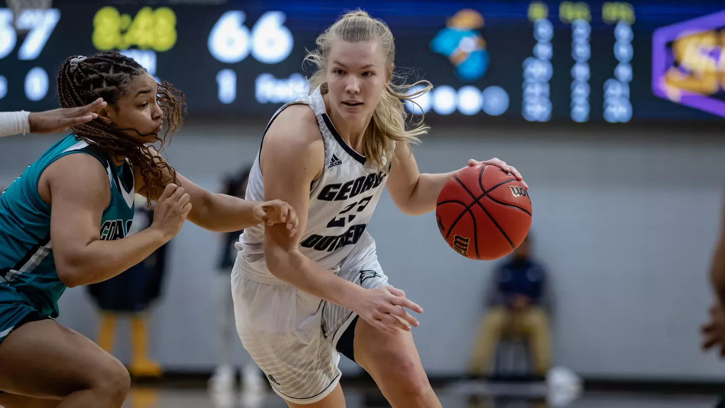 Tatum Barber drives the lane against Coastal Carolina