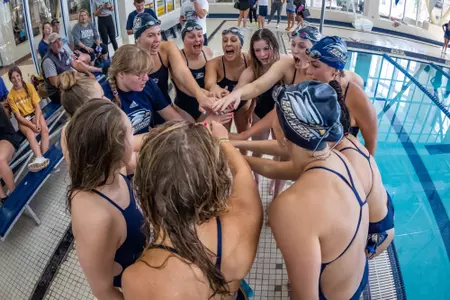 Team huddle after 2022 Georgia Southern Intrasquad Swimming & Diving meet at RAC Pool on September 24, 2022 in Statesboro, Georgia. (Photograph by AJ Henderson / Georgia Southern Athletics)