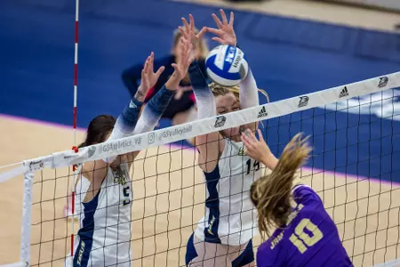 Georgia Southern middle blocker Grace Underwood (14) and Georgia Southern return specialist Jordan Christy (5) during the NCAA women’s volleyball game between Georgia Southern and James Madison at Hanner Fieldhouse on October 29, 2022 in Statesboro, Georgia. (Photograph by AJ Henderson / Georgia Southern Athletics)
