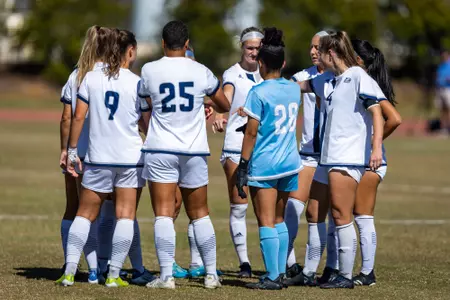 Georgia Southern team huddle before the NCAA womenâ??s soccer match between Georgia Southern and James Madison at Eagle Field at the Erk Russell Athletic Park on October 23, 2022 in Statesboro, Georgia. (Photograph by AJ Henderson / Georgia Southern Athletics)