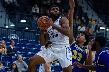 Georgia Southern redshirt freshman guard Amar Augillard (21) during the NCAA men’s basketball game between Georgia Southern and Trinity Baptist at Hanner Fieldhouse on November 12, 2022 in Statesboro, Georgia. (Photograph by AJ Henderson / Georgia Southern Athletics)