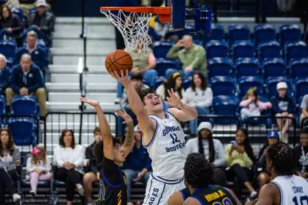 Georgia Southern redshirt senior forward Andrei Savrasov (12) during the NCAA menâ??s basketball game between Georgia Southern and MOrehead State at Hanner Fieldhouse on December 14, 2022 in Statesboro, Georgia. (Photograph by AJ Henderson / Georgia Southern Athletics)