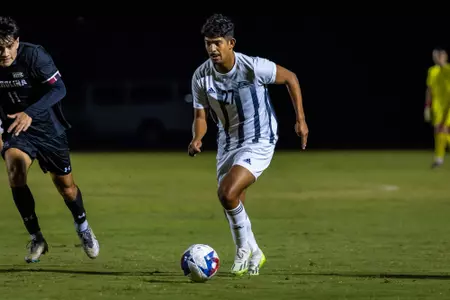 Georgia Southern men's soccer player Jacob Sandun (27) drives the ball upfield in a Sun Belt Conference match against the South Carolina Gamecocks on Oct. 18 at Eagle Field.