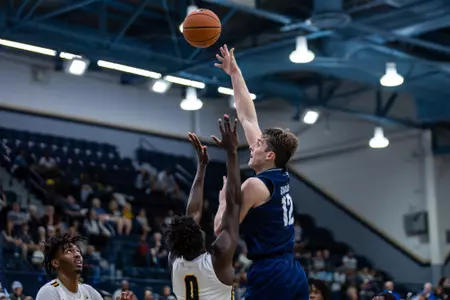 Georgia Southern redshirt senior forward Andrei Savrasov (12) during the NCAA men’s basketball game between Georgia Southern and Appalachian State at Hanner Fieldhouse on February 24, 2023 in Statesboro, Georgia. (Photograph by AJ Henderson / Georgia Southern Athletics)