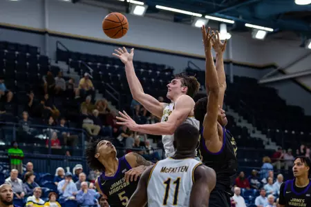Game action during the NCAA men’s basketball game between Georgia Southern and James Madison at Hanner Fieldhouse on February 9, 2023 in Statesboro, Georgia. (Photograph by AJ Henderson / Georgia Southern Athletics)