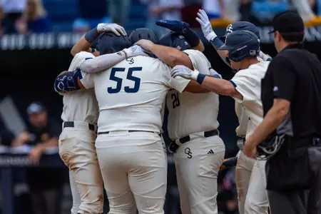 Corey Dowdell celebrates hitting a grand slam during the NCAA baseball game between Georgia Southern and ULM at Jack Stallings Field at J.I. Clements Stadium on April 30, 2023 in Statesboro, Georgia. (Photograph by AJ Henderson / Georgia Southern Athletics)