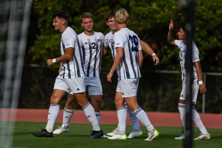 The Georgia Southern men's soccer team celebrates a goal by Zachary Martin (9) in a preseason match against the Stetson Hatters. The match would end in an 1-1 tie.