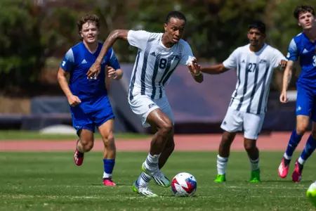 Kevin Pierre takes the ball upfield against UNC Asheville on Aug. 27, 2023.
