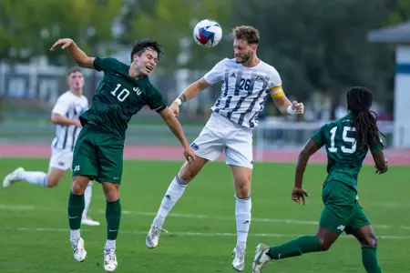 Georgia Southern defender Alistair Danjon (26) heads a ball during a home contest at Eagle Field against the Jacksonville Dolphins on Tuesday, September 12.