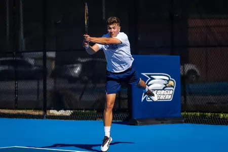 Georgia Southern freshman Aaron Williams during the NCAA men’s tennis match between Georgia Southern and Southern Miss at Wallis Tennis Center on April 15, 2023 in Statesboro, Georgia. (Photograph by AJ Henderson / Georgia Southern Athletics)