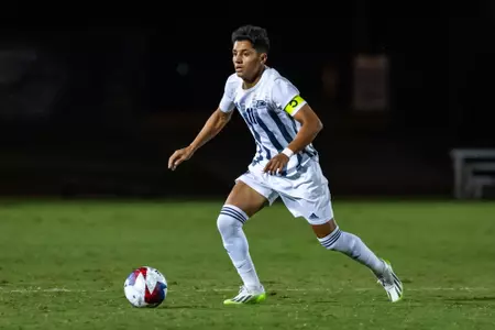 Georgia Southern midfielder Mauro Gutierrez-Solis (11) brings a ball upfield during an NCAA men's soccer match against North Florida in Statesboro, Ga.