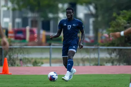 Edward Mensah (17) takes the ball up the pitch for the Eagles in a preseason exhibition against Clayton State on Sunday, Aug. 19.