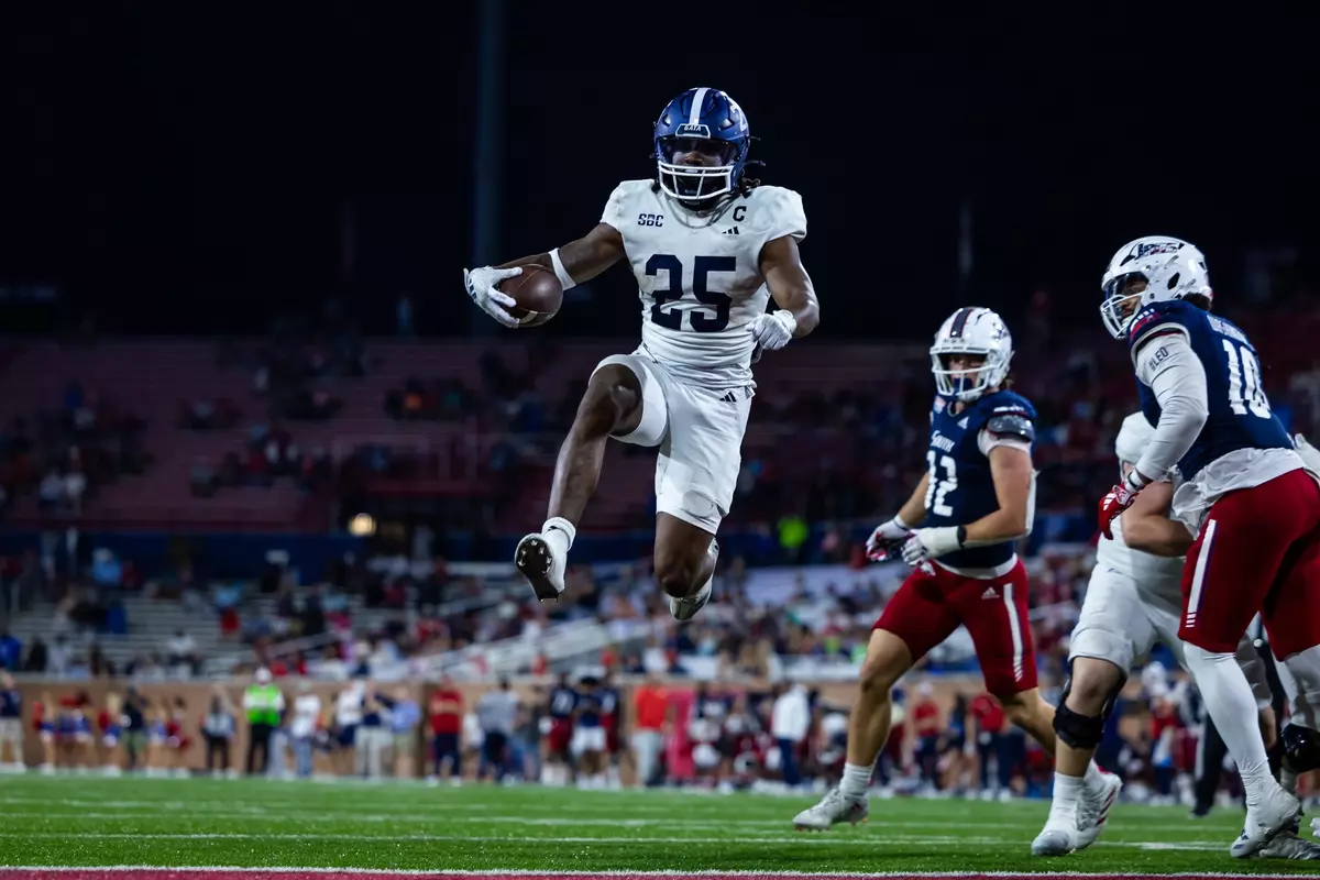 Jalen White scores a touchdown during the NCAA football game between Georgia Southern and South Alabama at Hancock Whitney Stadium on November 2, 2024 in Mobile, Alabama. (Photograph by AJ Henderson / Georgia Southern Athletics)