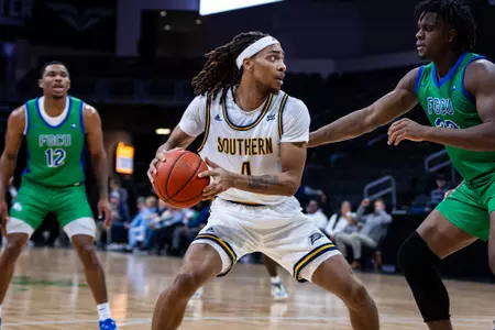 Georgia Southern junior forward/center David Jones (4) during Coastal Empire Eagle Classic men’s basketball game presented by Savannah/Hilton Head International Airport and Savannah Logistics Group between Georgia Southern and Florida Gulf Coast at EnMarket Arena on December 19, 2023 in Savannah, Georgia. (Photograph by AJ Henderson / Georgia Southern Athletics)
