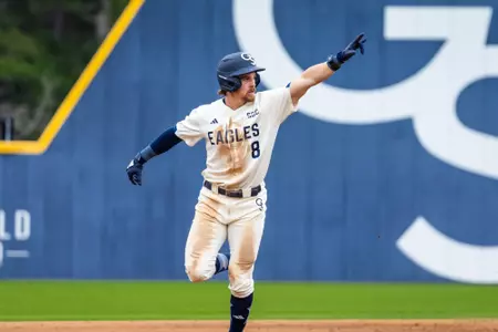 Georgia Southern baseball player Sam Blancato celebrates after hitting a home run in an NCAA baseball game against the Maryland Terrapins on Sunday, Feb. 18 at J.I. Clements Stadium in Statesboro, Georgia.