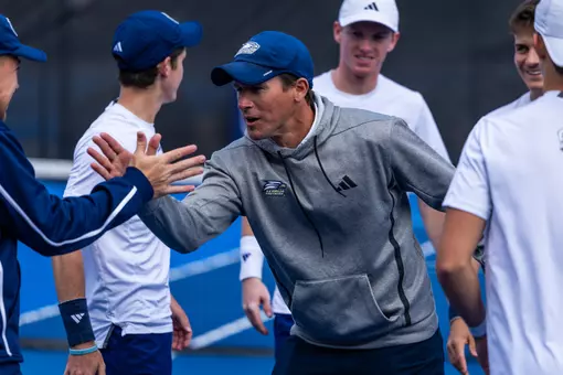 Georgia Southern Men's Tennis head coach Andrew Goodwin during the NCAA men’s tennis match between Georgia Southern and South Carolina State at Wallis Tennis Center on February 13, 2026 in Statesboro, Georgia. (Photograph by AJ Henderson / Georgia Southern Athletics)