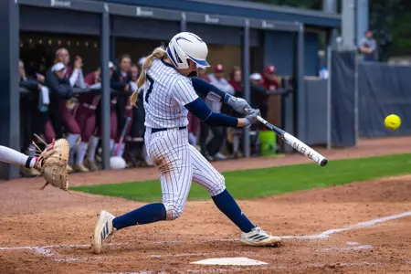 Valerie Combs hitting