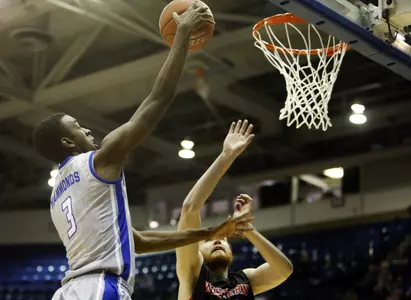 Forward Justin Hammonds (3) goes up for a shot in the second half.