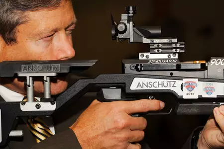 Jim Knowlton, AD, takes aim and fires a 10.5 in the standing position